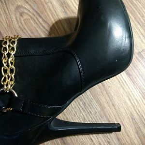 Just fab knee-high boots with chains